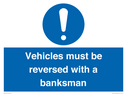 vehicles-must-be-reversed-with-a-banksman~